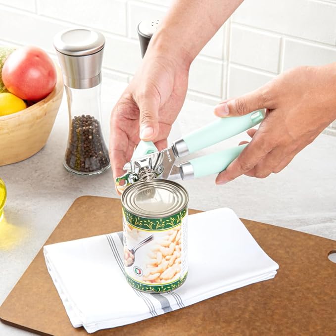 Restaurantware Comfy Grip 7.6 x 1.9 x 2.1 Inch Can Opener 1 Durable Manual Can Opener - Sharp Wheel Blade Grip Handle Mint Green Stainless Steel Hand-Held Can Opener Built-In Bottle Opener