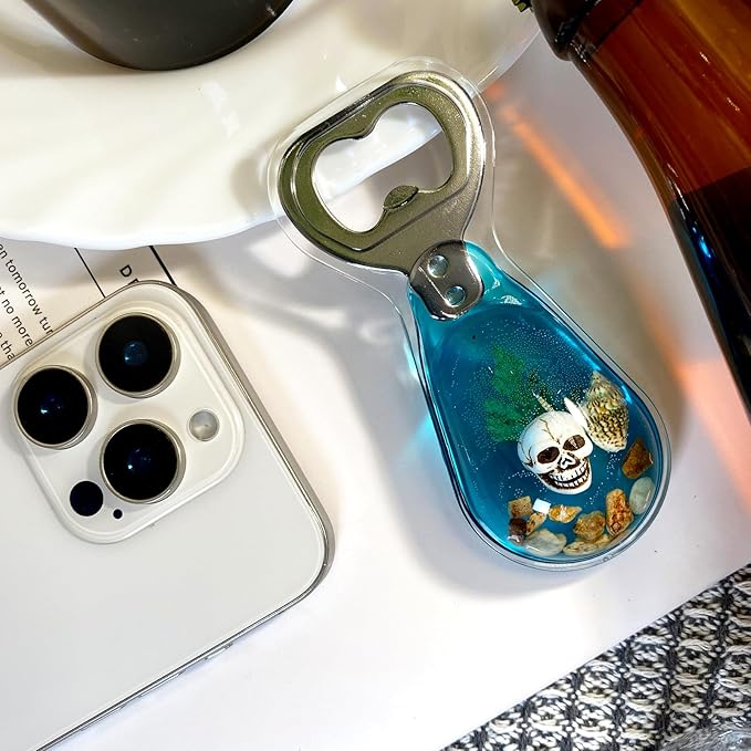Magnetic Bottle Opener – Original Design Skull Sinking in Ocean in Blue Resin – Strong Magnet for Fridge – Lightweight Gift for Goth Decor & Bartenders – Clear Blue, 1 PCS