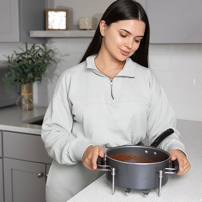 Fox Run Expandable Trivet for Hot Dishes with Heat Resistant Handles, Holds 4.75" to 16" Dishes